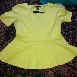 Yellow Peplum with heart cut out in the back